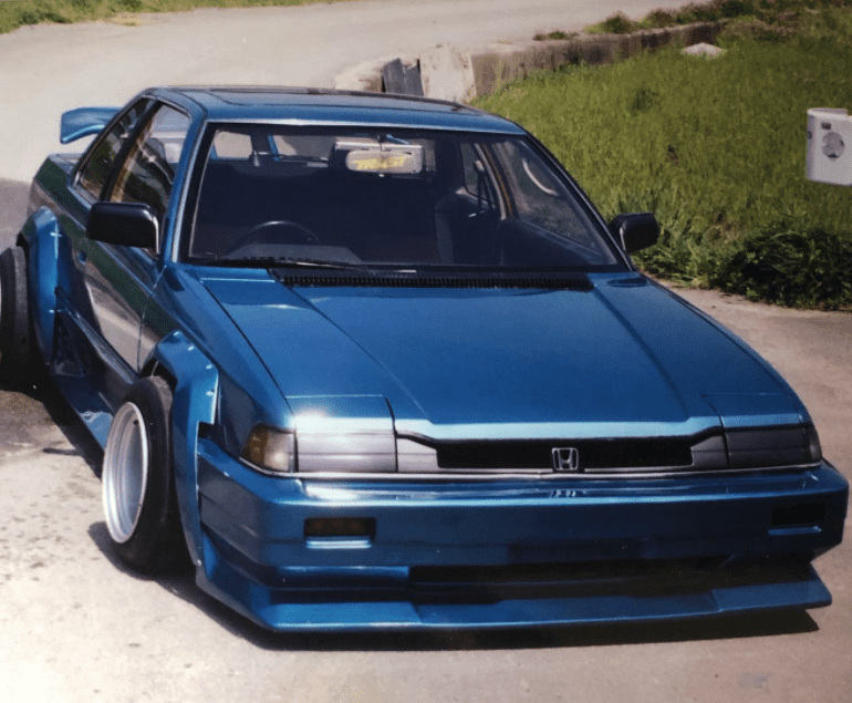 A Honda Prelude dressed up in period correct kaido racer parts
