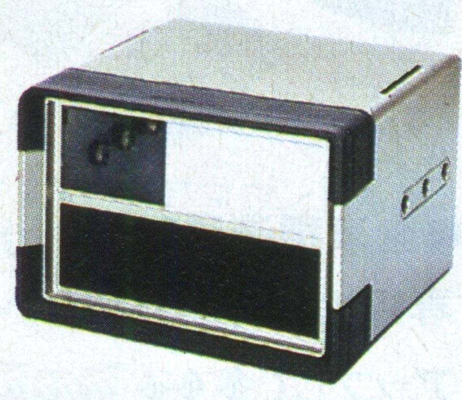 Vintage metal and plastic camera viewfinder unit with rectangular design and mounting slots on the right side.