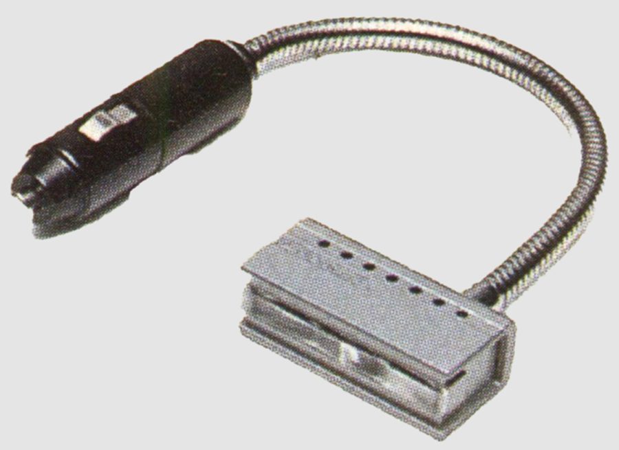 Vintage Japanese hardware cable with metal connectors, flexible arm, and dark casing for electronics and industrial use.