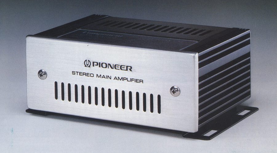 Pioneer stereo main amplifier, vintage audio equipment, silver and black design, angled view on a gray background.