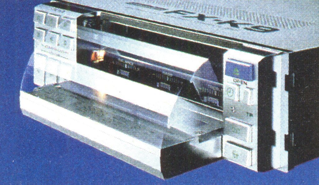 Old-school dot matrix printer with paper feed drawer extended, buttons, and LED display on the right side.