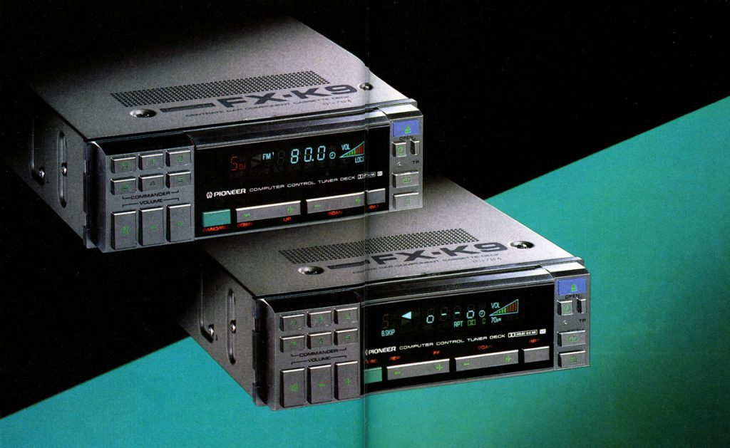 Vintage Pioneer FX-K9 car stereo system featuring digital display, manual tuning, and volume controls, green and black design.