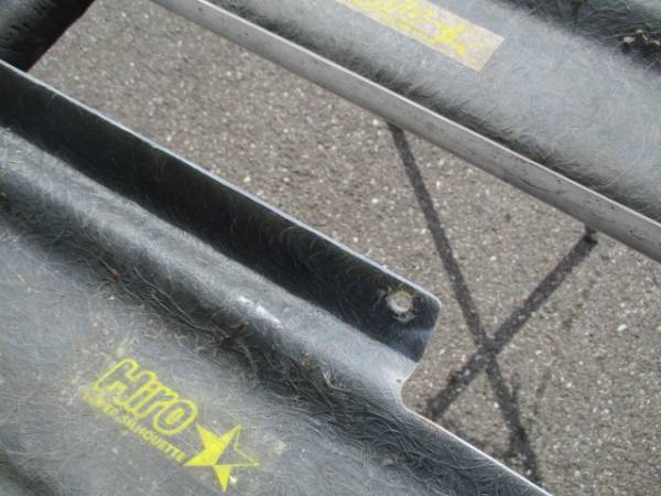 Close-up of a textured surface with Hiro Super Silhouette written in yellow Japanese and English text on a black background.