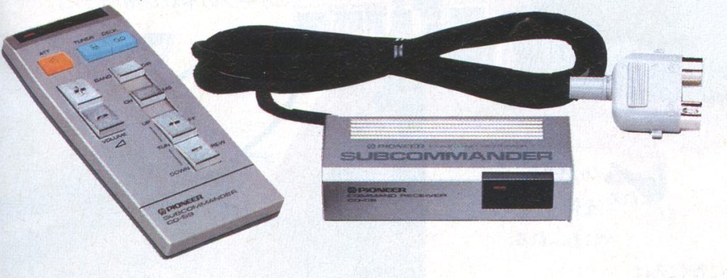 Vintage Pioneer audio control system with CD remote (CCM-4) and subcommander unit. Cables attached and visible.