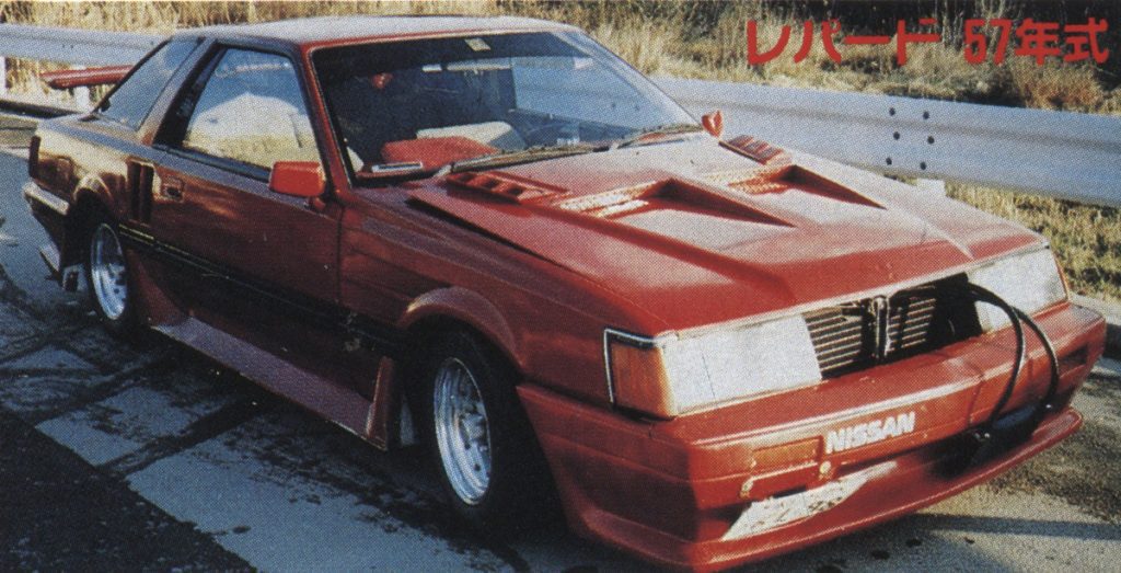 Red Nissan Leopard 1982 model with custom modifications parked on roadside. Japanese text translates to Leopard 57 Year Model.