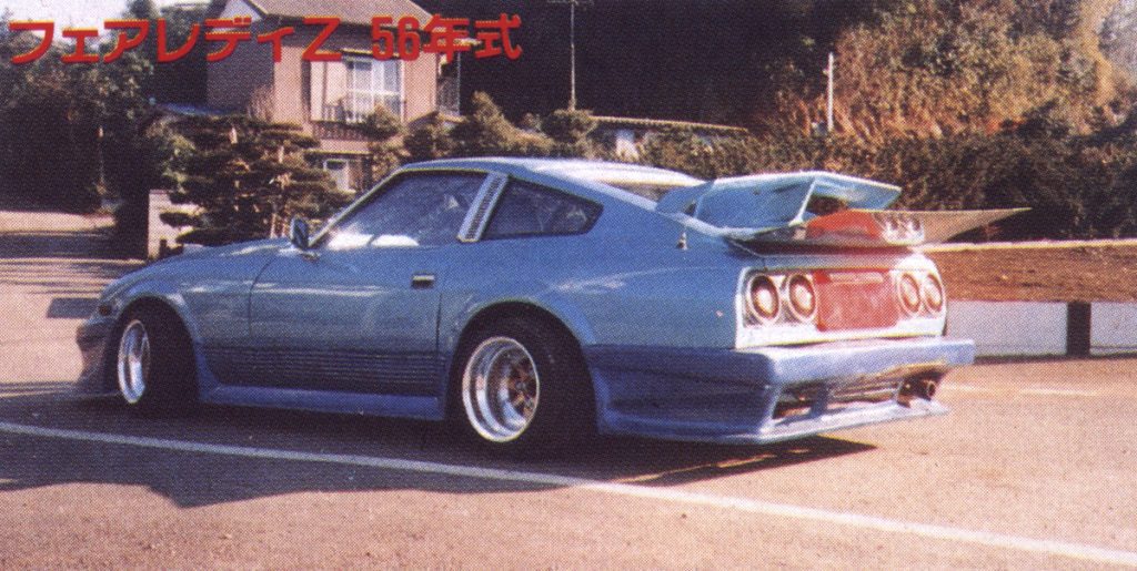 Modified Nissan Fairlady Z (S30) car in parking lot with Fairlady Z 56 in Japanese text above.