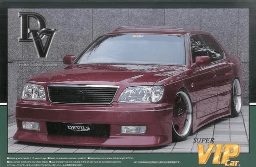 Custom VIP car with a sleek red body kit and Devils front plate, Japanese text indicating Super VIP Car.