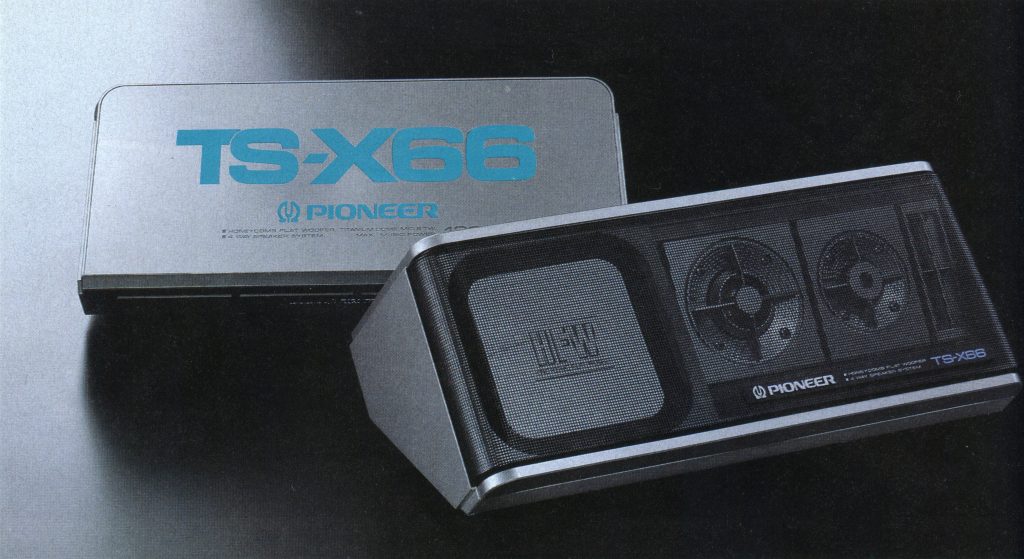 Vintage Pioneer TS-X66 car speaker system on a black background.