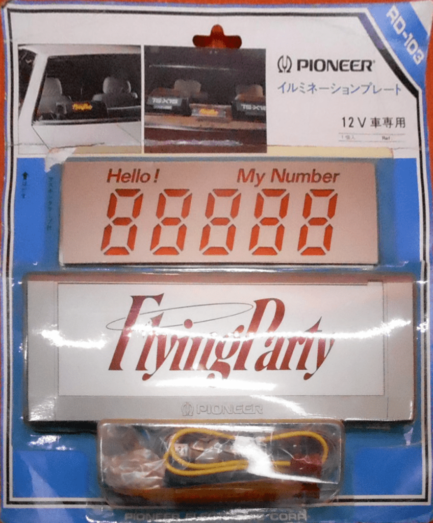 Pioneer RD-103 car illumination plate with digital display and 'Flying Party' label in original packaging.