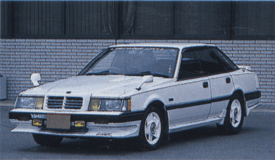 White classic Japanese sports car F30 Nissan Leopard sedan parked, featuring custom body kit and retro style, text on the front reads YAMAMOTO.