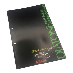 DIATONE car audio components catalog, featuring Mitsubishi logo and speakers. Japanese text: Run with DIATONE.