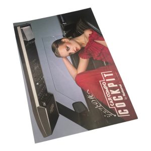 Vintage advertisement for National's Cockpit car stereo featuring a woman in a red dress. Japanese text: 静けさの夜へ (To a quiet night).