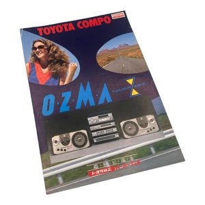Vintage Toyota Compo Ozma Twilight Zone advertisement with speakers and a woman in sunglasses.