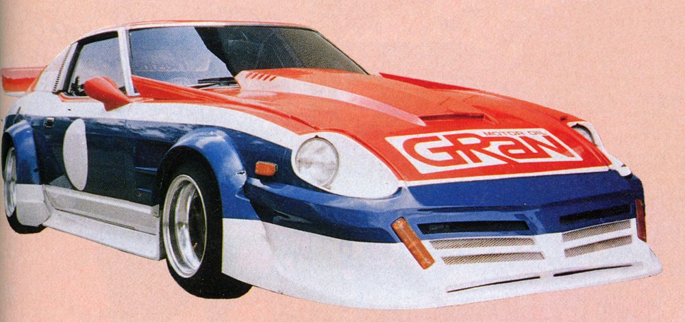 Vintage red, white, and blue sports car with GRAN logo on hood, featuring sleek design and custom modifications.