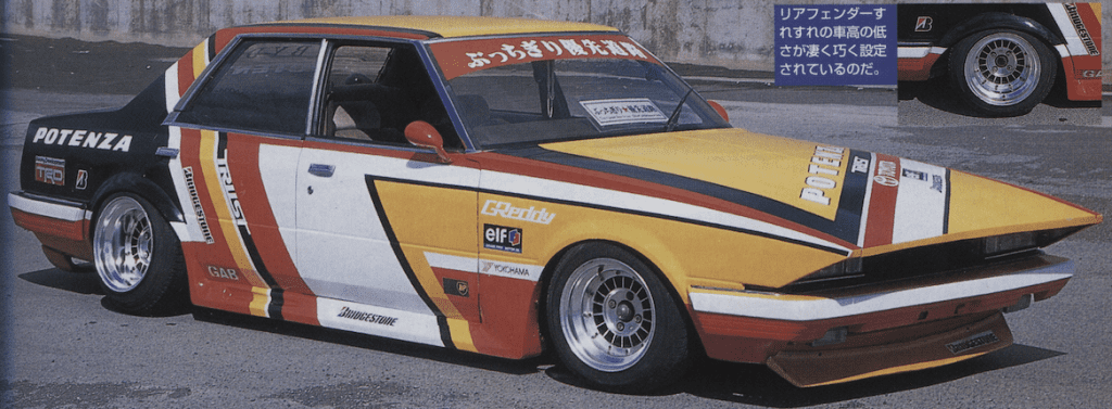 Vintage race car with colorful decal design, featuring Potenza branding and lowered suspension.