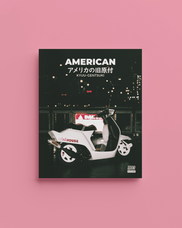 Book titled American with a pink background, featuring a vintage scooter at night with city lights.
